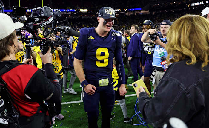 Jan 8, 2024; Houston, TX, USA; Michigan Wolverines quarterback J.J. McCarthy (9) celebrates after beating the Washington Huskies in the 2024 College Football Playoff national championship game at NRG Stadium.